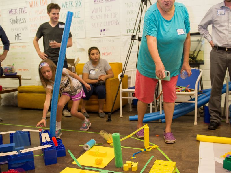 Participants at city block activity event